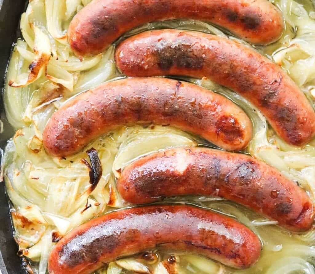 Dutch oven bratwurst and sweet onions
